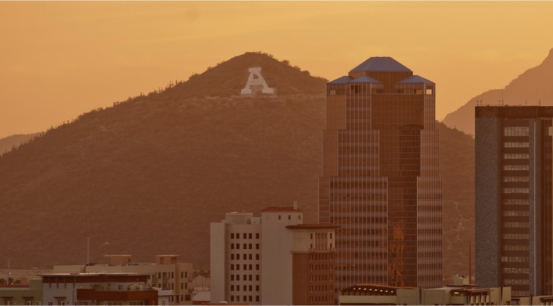 Image of downtown Tucson and A-Mountain as the sun sets
